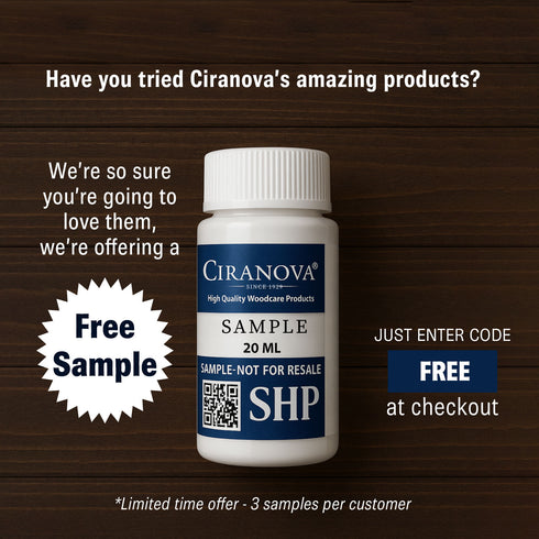 Ciranova wood care product free sample bottle on a wooden background